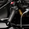 2025 Yamaha YZF-R1M handlebar detail. Close-up of grip, controls, and brake lever.