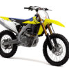 A SUZUKI RM-Z450 is showcased from the side against a white background, featuring a yellow frame, black handlebars, exposed engine, knobby tires, and a blue seat.