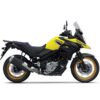 Side view of a yellow and black SUZUKI V-STROM 650XT motorcycle with spoked wheels, a black muffler, and blue seat accents on a plain white background.