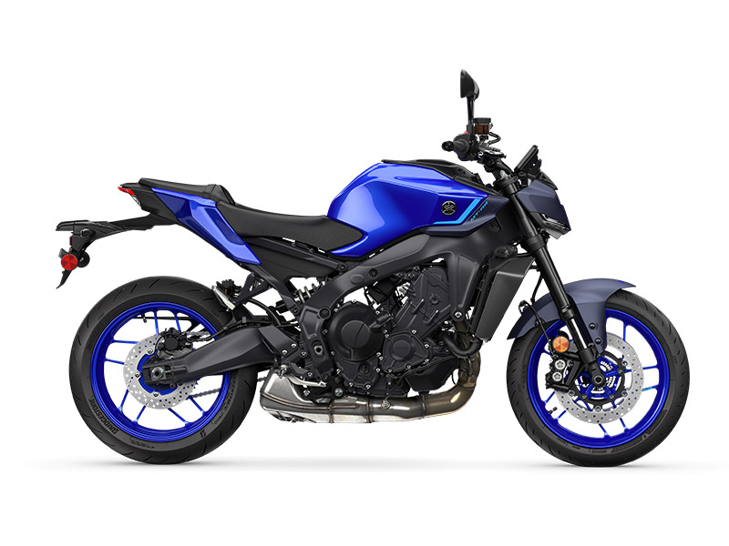 The YAMAHA MT-09 2024 motorcycle, displayed in a sleek side view, highlights its detailed engine and frame, featuring a sporty blue and black design with a single seat and rear fender.