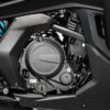 Close-up of a CFMOTO 650 GT ABS motorcycle engine showcasing visible branding and mechanical components in a sleek black and metallic design.