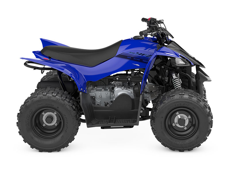 The YAMAHA YZF50 2025 features a blue design with black trim and rugged tires, showcased from the side against a white backdrop.