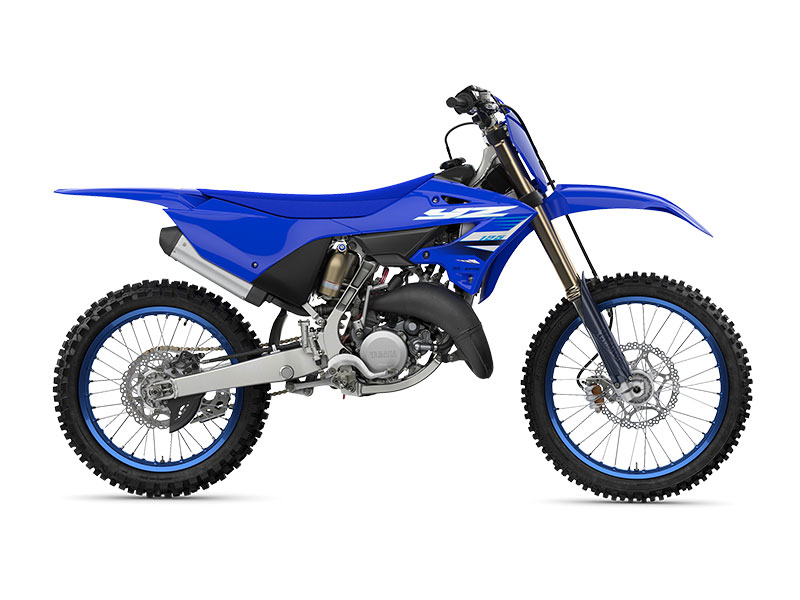 The YAMAHA YZ125 2025 is a blue off-road motorcycle featuring rugged tires, an exposed engine, and a sporty design, presented in a side profile.