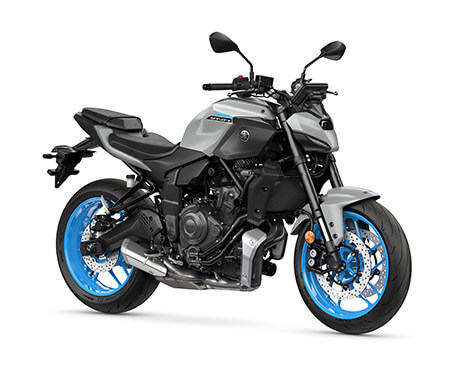 The YAMAHA MT-07 HO Y-AMT features a gray body with blue wheels, displayed in a side view against a white background.